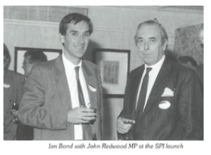 A black and white photo showing (l-r) John Redwood MP and Ian Bond at SPI's launch party